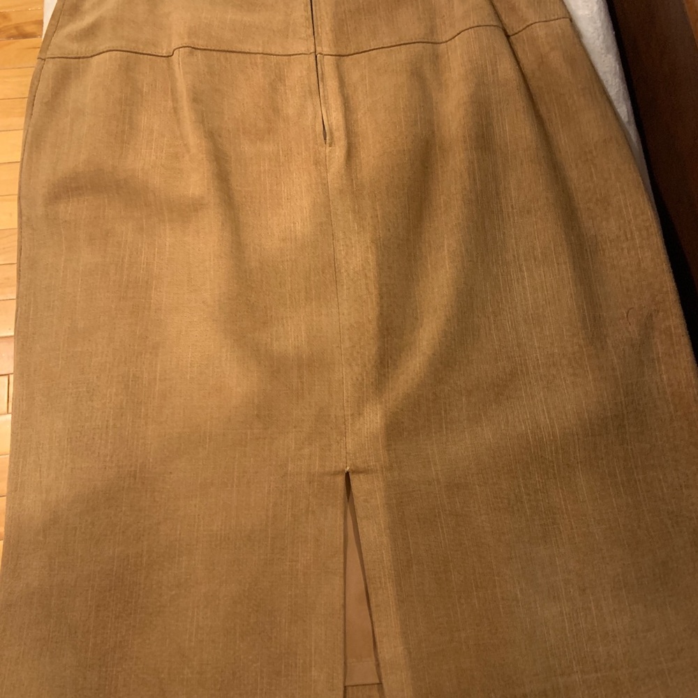Genuine suede leather skirt. Fully lined. Knee length size 10. No signs of wear